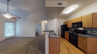 Located at 8200 Micron Dr in San Antonio, Texas, this single-floor residence offers a practical and comfortable layout with a clean, neutral aesthetic throughout. The open-concept kitchen anchors the living space, featuring a peninsula with a double stainless steel sink and dark countertops, warm-toned wooden cabinetry, a tile backsplash, and black appliances including a refrigerator, range, and over-the-range microwave. Wood-look flooring runs through the kitchen and adjacent dining area, while plush carpet extends into the living and bedroom spaces. The living room benefits from soaring vaulted ceilings and a ceiling fan with light kit, creating an airy, open feel, with natural light streaming in through multiple windows dressed with horizontal blinds. The bedrooms are well-proportioned, each carpeted and equipped with ceiling fans and windows that invite in natural light. The bathroom features a full tiled tub-and-shower combination with clean white tilework accented by a neutral border. A utility corridor off the kitchen provides access to additional storage and utility connections. The overall interior presents a straightforward, functional design with consistent finishes and a light, neutral color palette throughout.