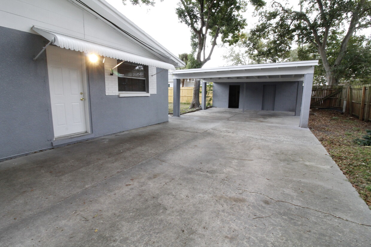 Exterior door, driveway, and carport - 1703 Bonnie Gail Dr