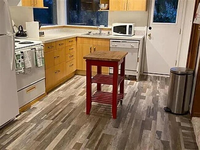 Building Photo - Two private patios with furniture