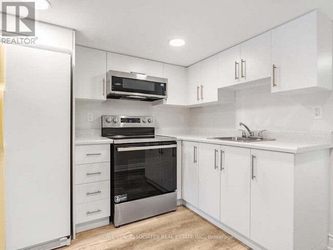 Building Photo - BASEMENT - 213B BLACKTHORN AVENUE