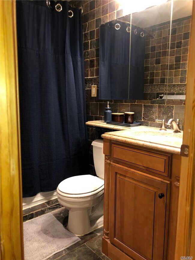 Building Photo - 61-12-61-69 69th St