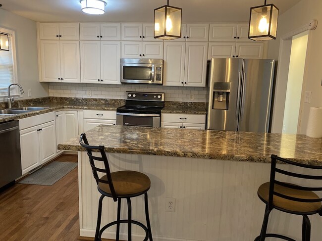 kitchen with island - 3705 Pfost Ave