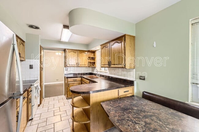 Photo - 8410 W 3rd Pl House