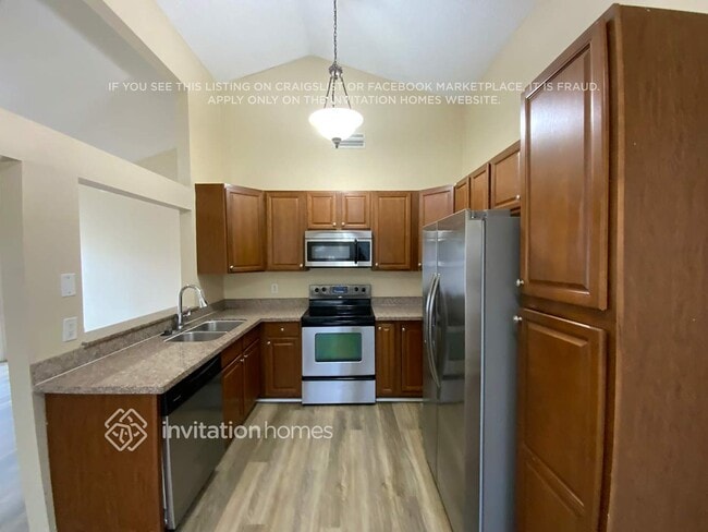 Building Photo - 8447 Red Wagon Ln