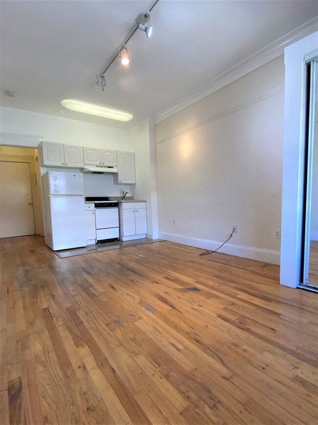Photo - Raymond Investments LLC. Apartments