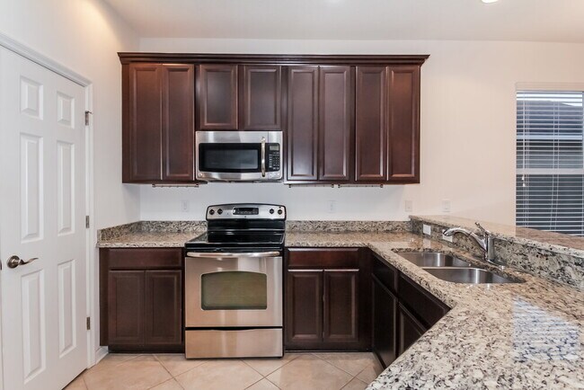 Building Photo - 8309 Deerland Bluff Ln