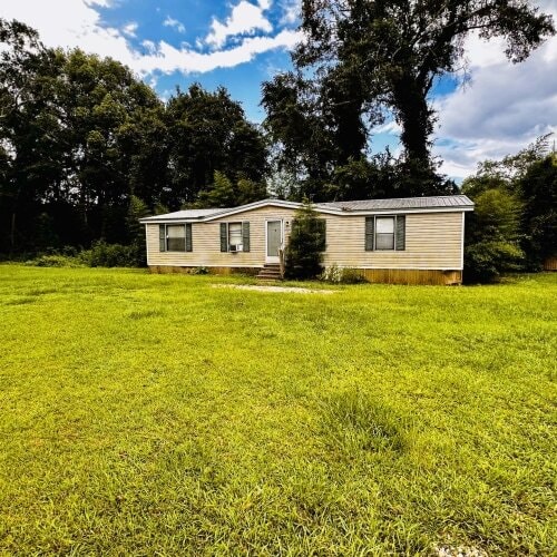 Building Photo - Whispering Pines
