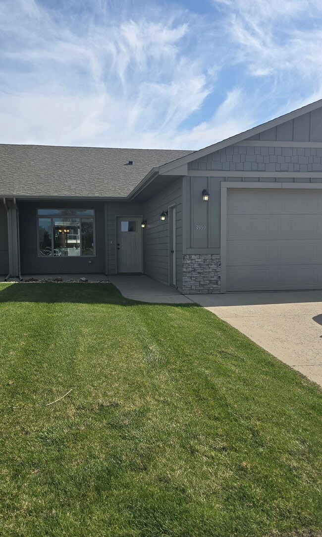 Lawn in Front, Small Patio next to front door, 2 Car Garage. - 3511 E Bison Trl