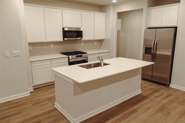 Foto del edificio - 8606 Blueberry Ash St