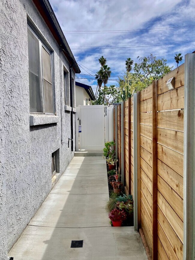 Private entry way and gate door. - 5172 Caspar Ave