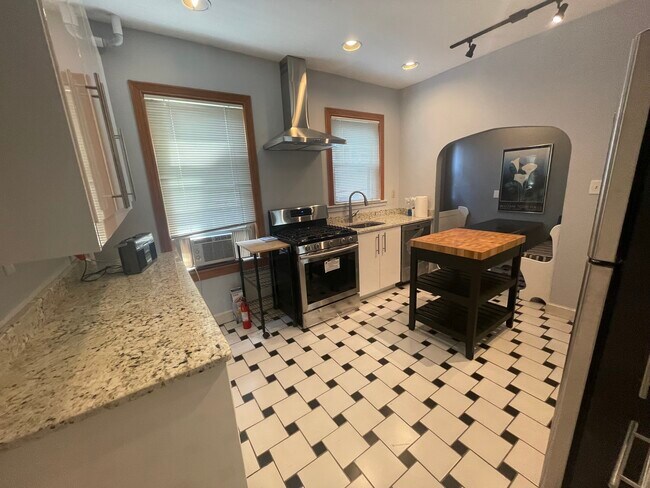 Large eat in kitchen, stainless steel ,granite counters . Brand new rehab - 28 Weld Hill St
