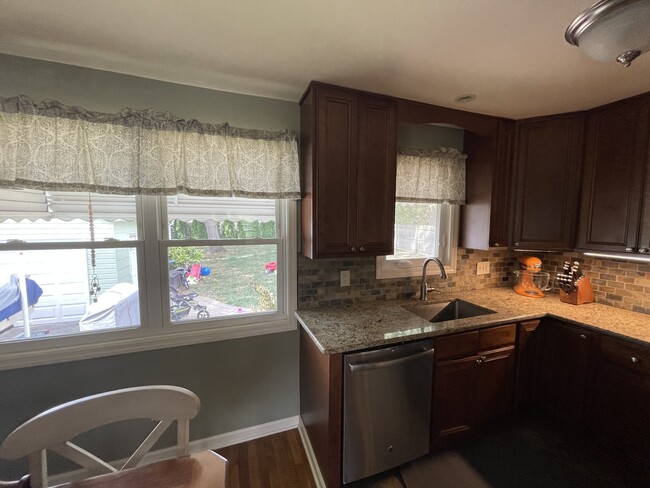 Granite countertops and solid wood cabinets - 8 Cornell Dr