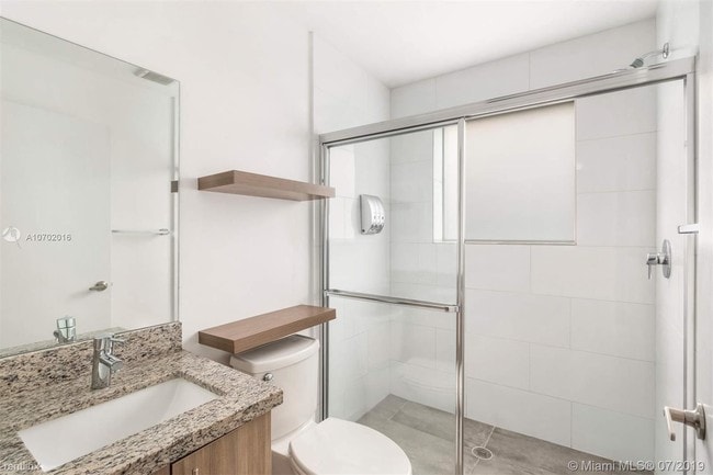 Building Photo - 1 br, 1 bath Apartment - 165 NW 39th St # 1A