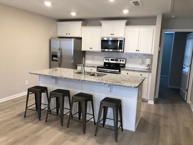 Foto del edificio - Brand New FURNISHED End Unit Townhome