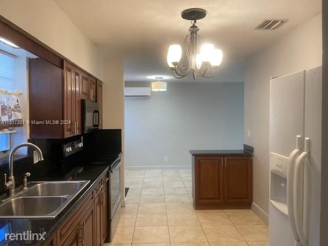 Foto del edificio - 4 br, 2 bath House - 4351 SW 18th St