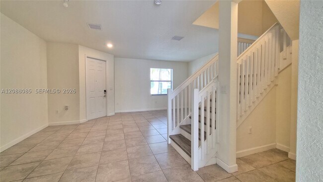 Building Photo - 10570 W 33rd Ln