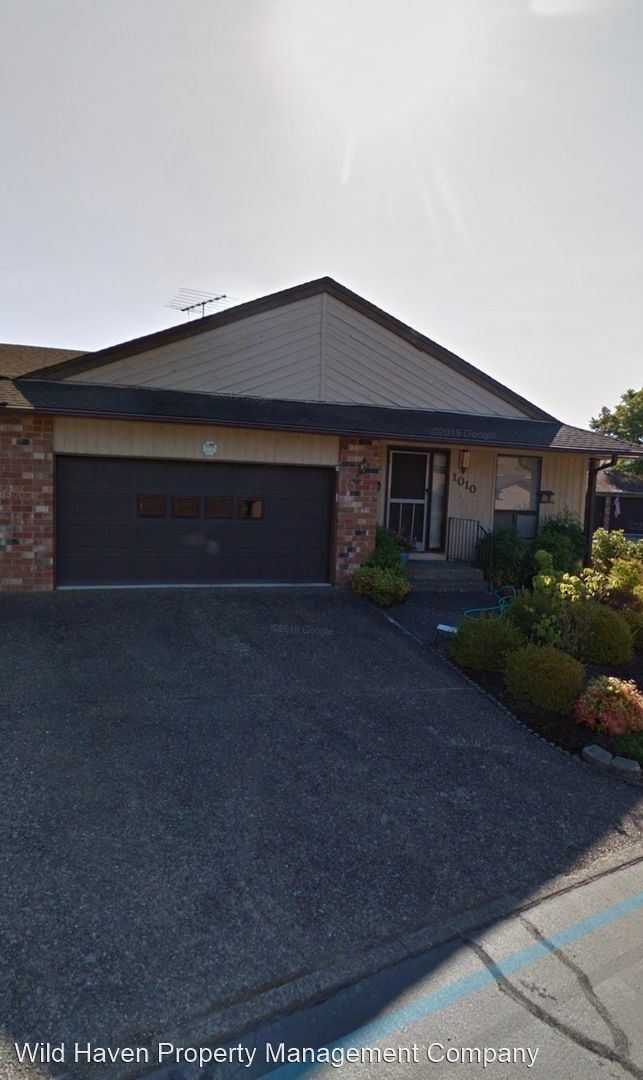 Foto del edificio - 3 br, 2 bath House - 1010 NW Summerwood Dr