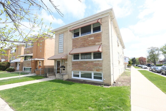 Building Photo - 5501 N Mango Ave
