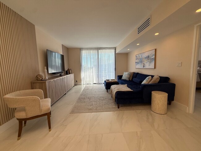 Living room with Smart TV - 500 Three Islands Blvd