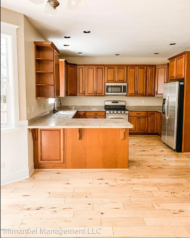 Building Photo - 3 br, 2.5 bath House - 6050 S Amethyst Road