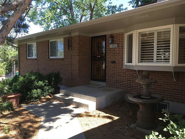 Front iron security door - 11920 W Alameda Pky