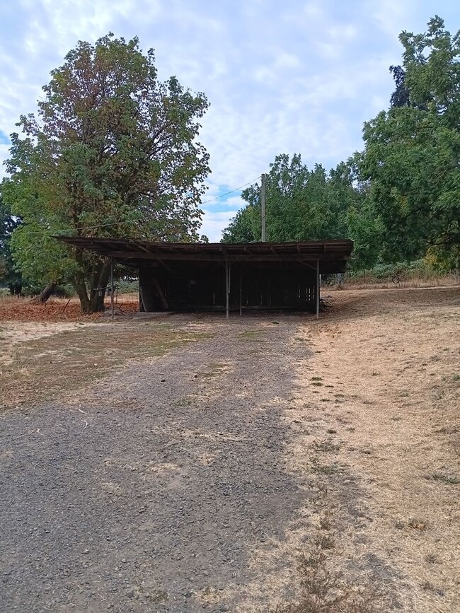 Building Photo - Beautiful Secluded Farmhouse & Shop is Available!