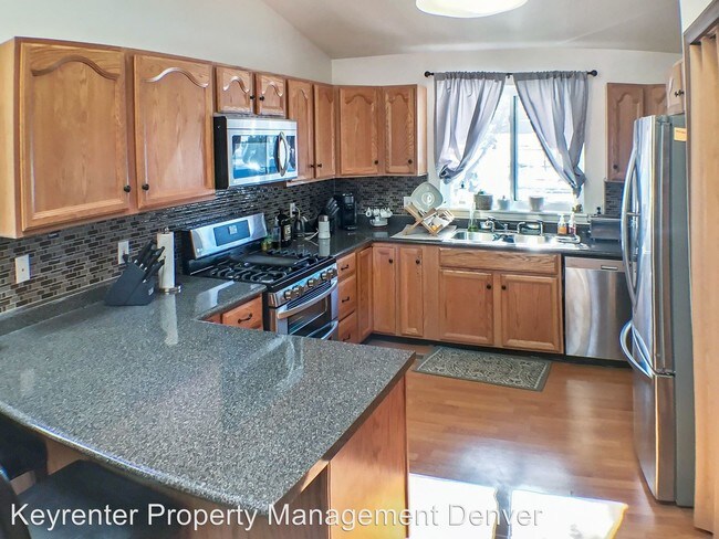 Building Photo - 4 br, 2 bath House - 7065 W Kentucky Ave