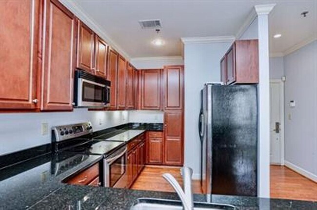 Foto del edificio - Beautiful Condo Available In Downtown Spar...