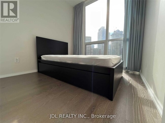 Building Photo - 45 Charles St E