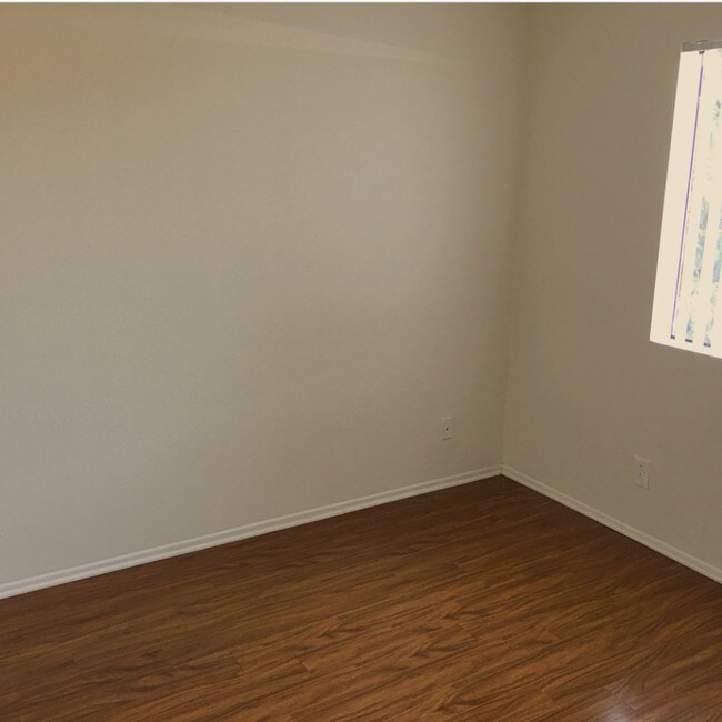 Building Photo - 7507 Woodman Ave