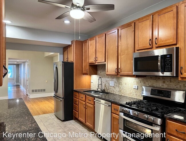 Building Photo - 4 br, 2 bath House - 842 W. Agatite Ave #2E