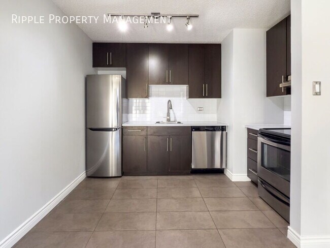 Photo du bâtiment - AMAZING 1 BED/ 1 BATH CONDO