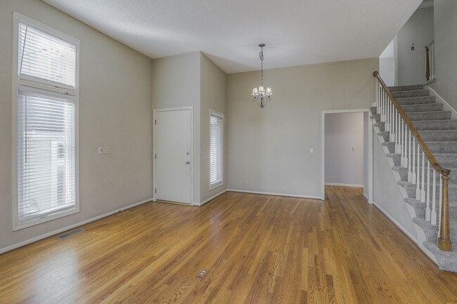 Building Photo - {11409} Updated Duplex in Fantastic Location + Two Car Garage + Main Level Master + Covered Deck