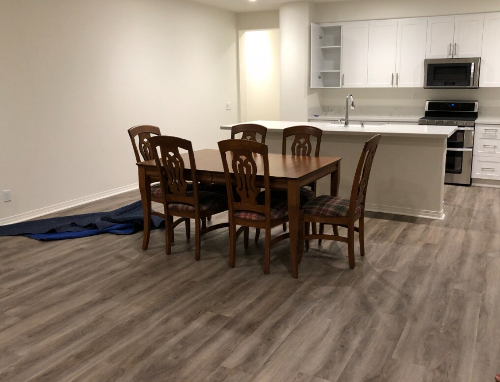 2nd foot kitchen and living room, with elegant dining tab.e - 2380 S Loom Ct