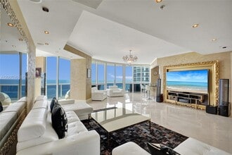 Building Photo - 18201 Collins Ave