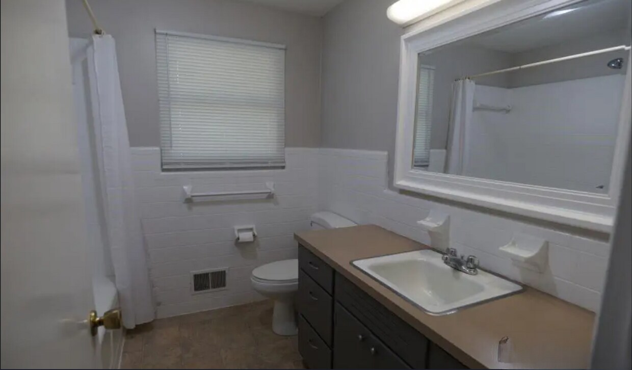 Building Photo - Comfortable 3 Bedroom Ranch with Carport & Lawn Care Included