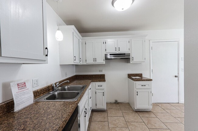 Building Photo - Updated 3 bedroom house with lots of extras!