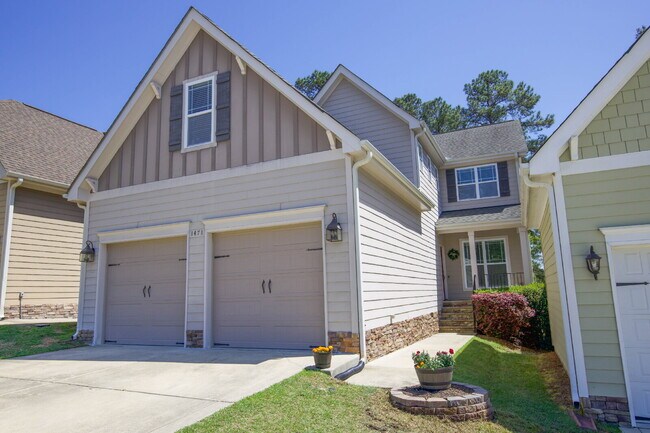 Building Photo - "Spacious 4-Bedroom Gem with 2.5 Baths at ...