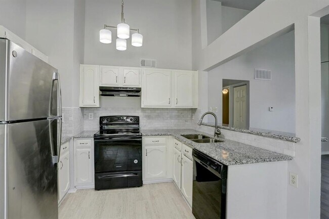 Building Photo - 24402 Running Iron Dr