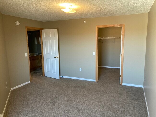 Dormitorio B4 - Windsong Apartments