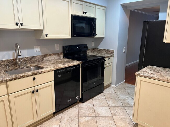 Building Photo - Stunning Three Finished Level Townhome Clo...
