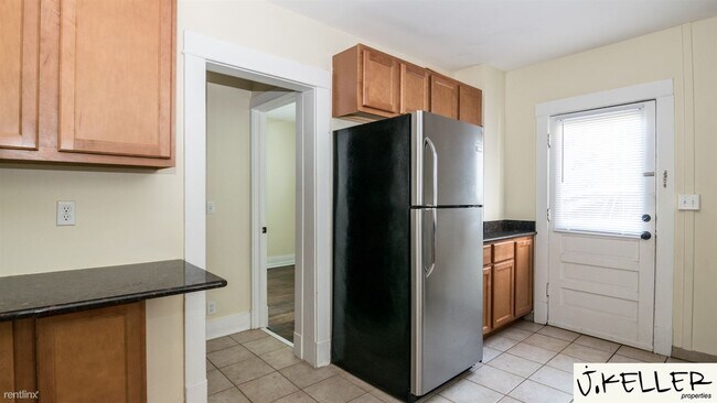 Foto del edificio - 4 br, 2 bath House - 221 W Mosley St