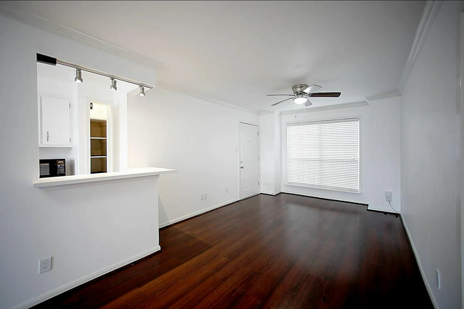 2bed living dark brown floor.JPG - Forest Oaks Apartments