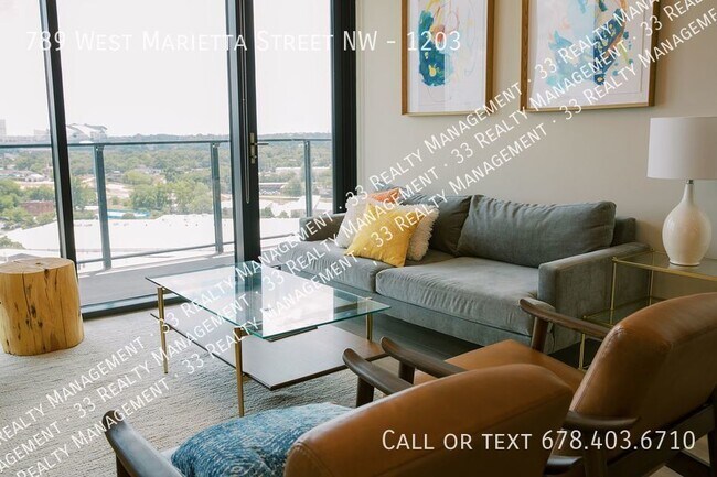 Building Photo - Modern West Midtown Condo Available for Re...