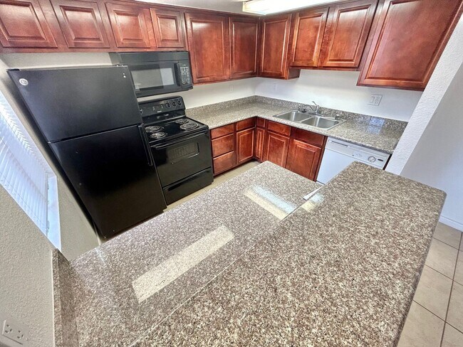 Building Photo - ADORABLE 2 BEDROOM 2 BATHROOM 1ST FLOOR CONDO