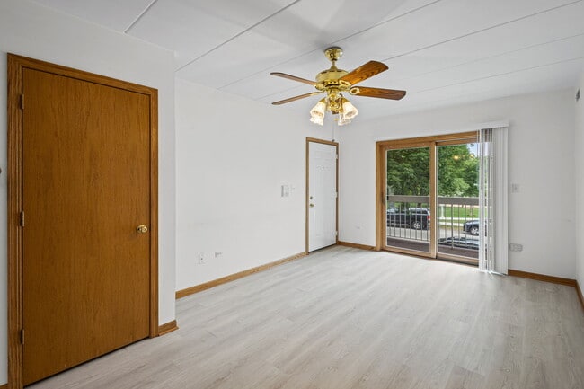 Living Room with access to wide balcony - 5632 S Narragansett Ave