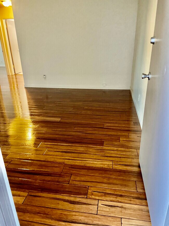 Refinished flooring (living room/entrance way) - 676 Garland Ave