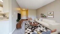 This 800 square foot apartment offers a thoughtful layout maximizing its compact space. The open-concept living area combines the kitchen, dining, and living rooms, creating a spacious feel. The modern kitchen features white cabinetry, stainless steel appliances, and wood-look flooring. The living room boasts a striking black and white checkerboard area rug, mid-century modern furniture, and access to a balcony with outdoor views.

Both bedrooms are well-appointed, with the primary bedroom measuring 150 square feet. They feature large windows with vertical blinds, allowing for abundant natural light. The bedrooms are decorated in a neutral palette with pops of color in the bedding and accessories.

The bathrooms are sleek and contemporary, with one showcasing a marble-look shower surround. Throughout the apartment, the decor is a mix of modern and mid-century elements, creating a cohesive and stylish ambiance. Clever storage solutions and multi-functional furniture pieces help maximize the available space in this efficient two-bedroom home.