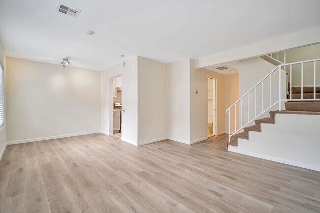 Building Photo - 2-story condo featuring 2 bedrooms and 1.5...