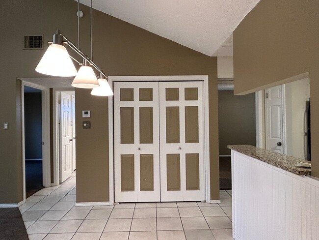 Building Photo - Charming 2BR Condo with Vaulted Ceilings, Fireplace & Pool Access